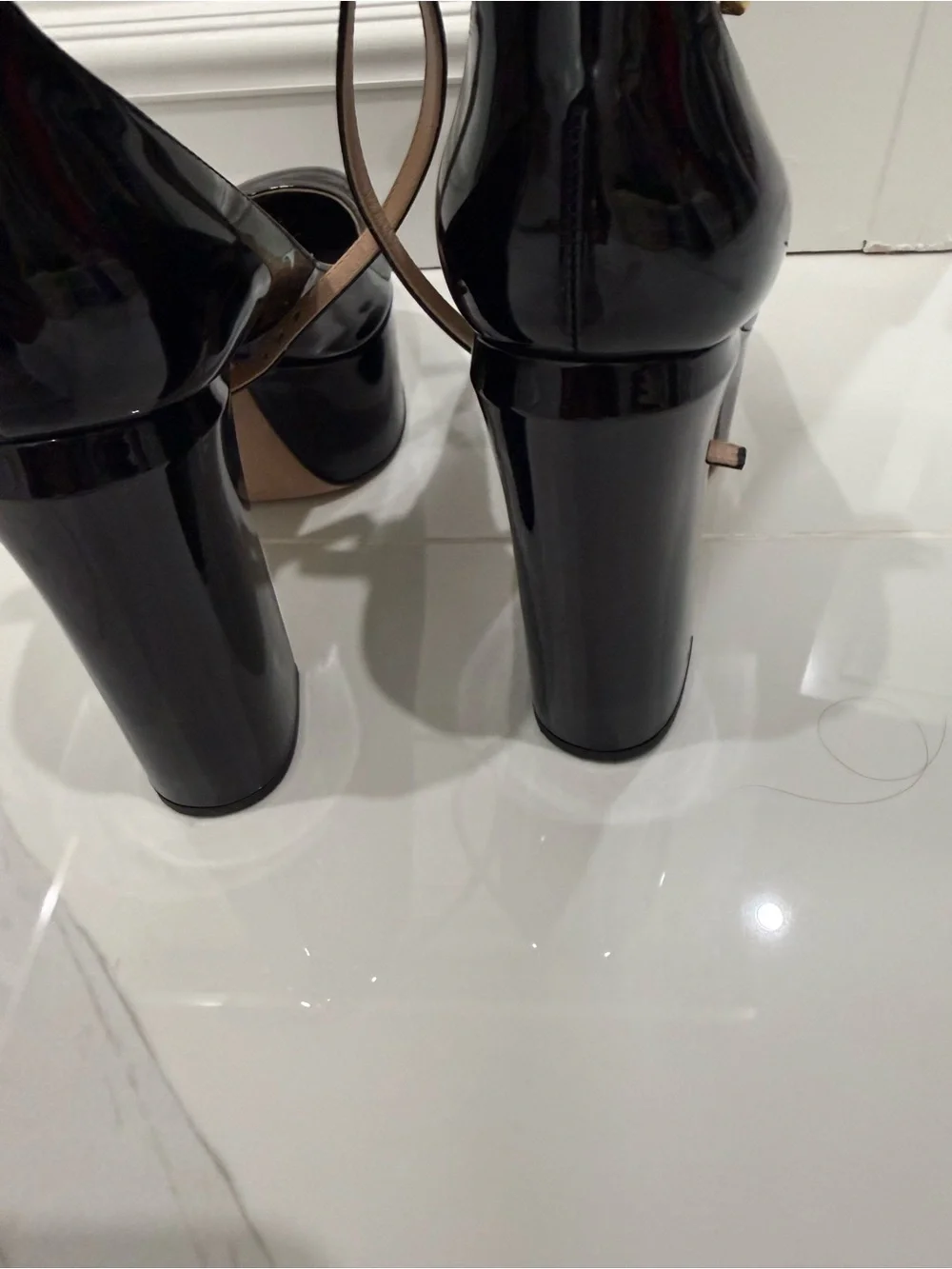 Valentino Garavani Black Patent Platform Mary Jane Pumps with Gold Charm